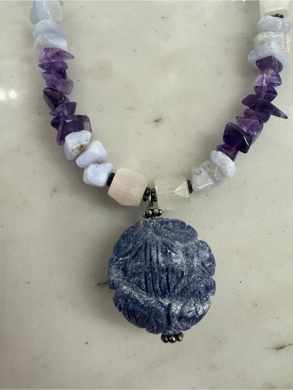 Purple and White beaded necklace with Asian inspired Medallion